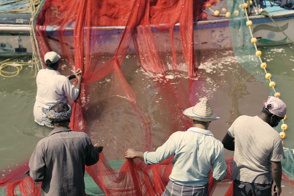 Preparing the nets for fishing at Marari Beach